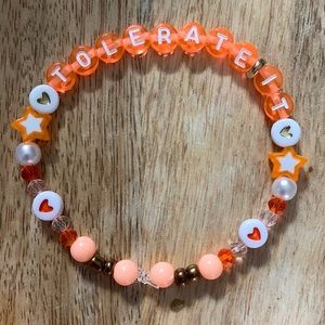 5 for $20 Taylor Swift Handmade Friendship Beaded Bracelet
“Tolerate It”